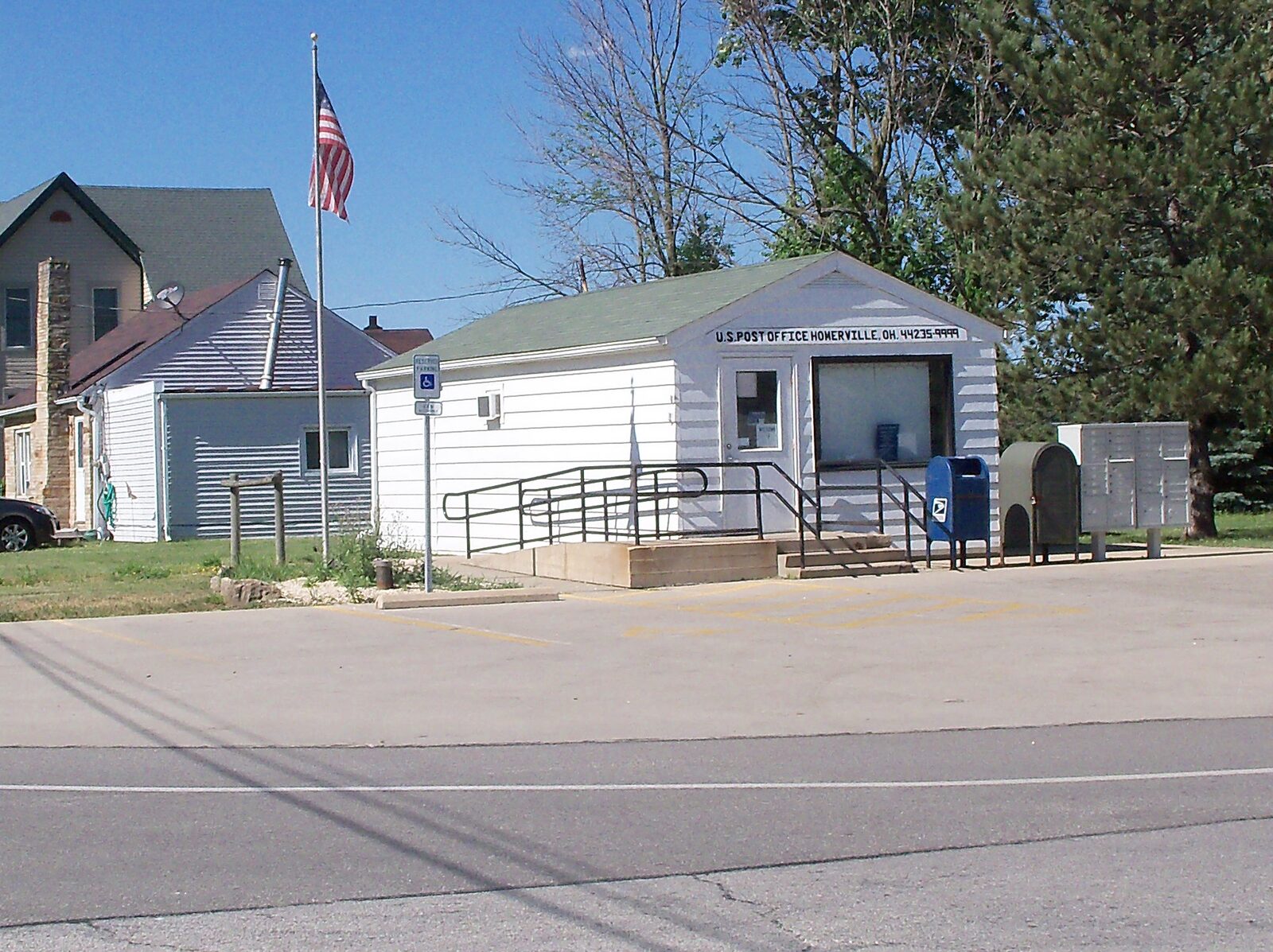 The Homerville, Ohio post office, a modest wood-sided building at the center of Homer Township.