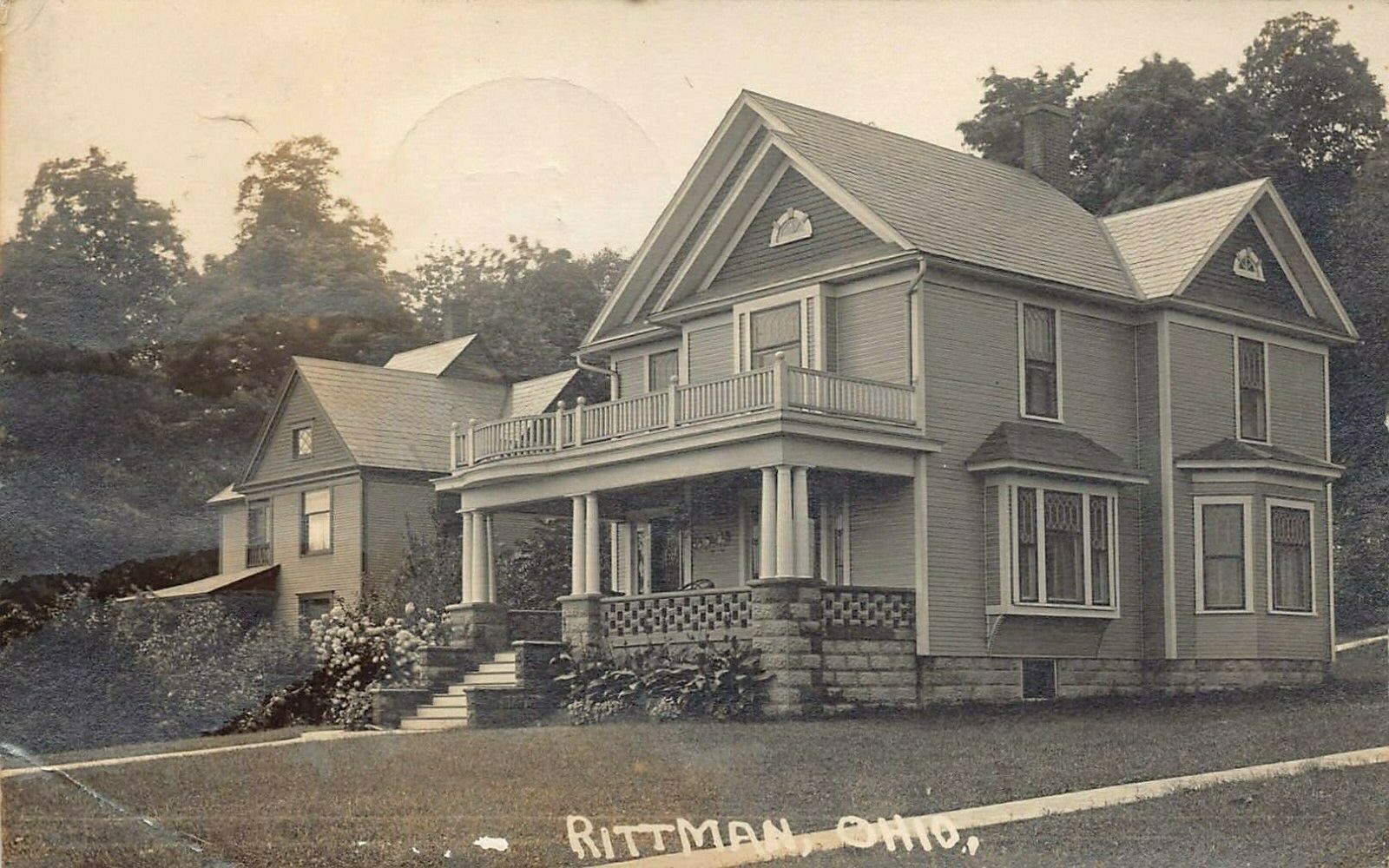 Real-photo postcard of Rittman, Ohio, postmarked October 13, 1911.