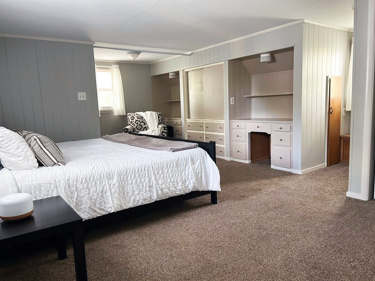 Bedroom 4 with the built-in dresser and shelves